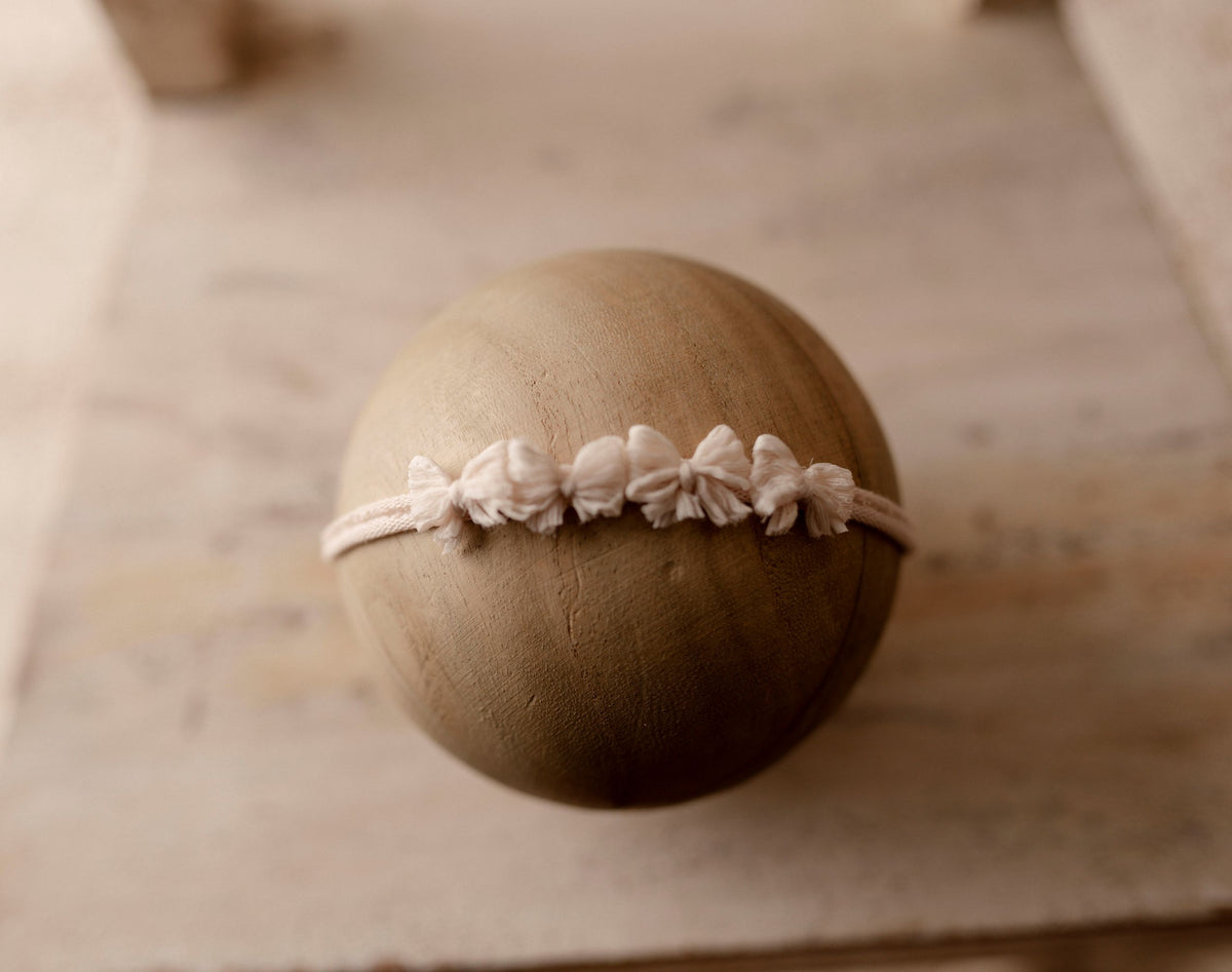 Buttercream newborn stretch tieback by Olive & Lace