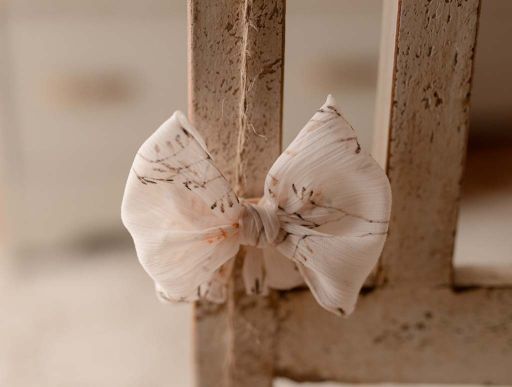 Wildflower bow on a non-slip clip by Olive & Lace