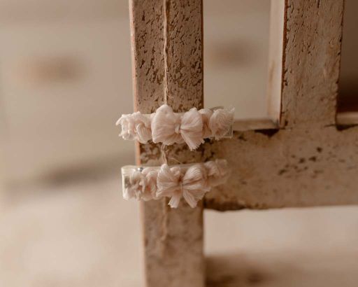 Ivory ruffle bow on a non-slip clip by Olive & Lace