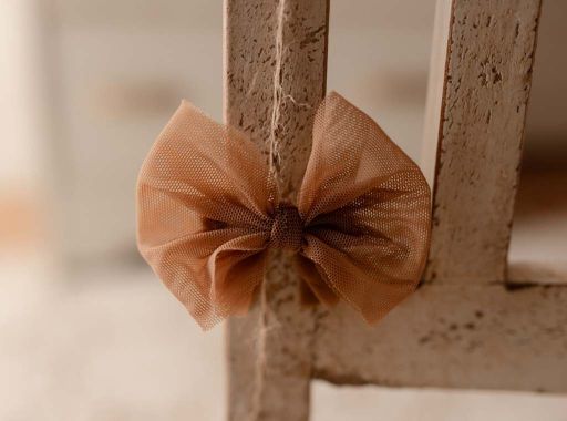 Mocha bow on a non-slip clip by Olive & Lace
