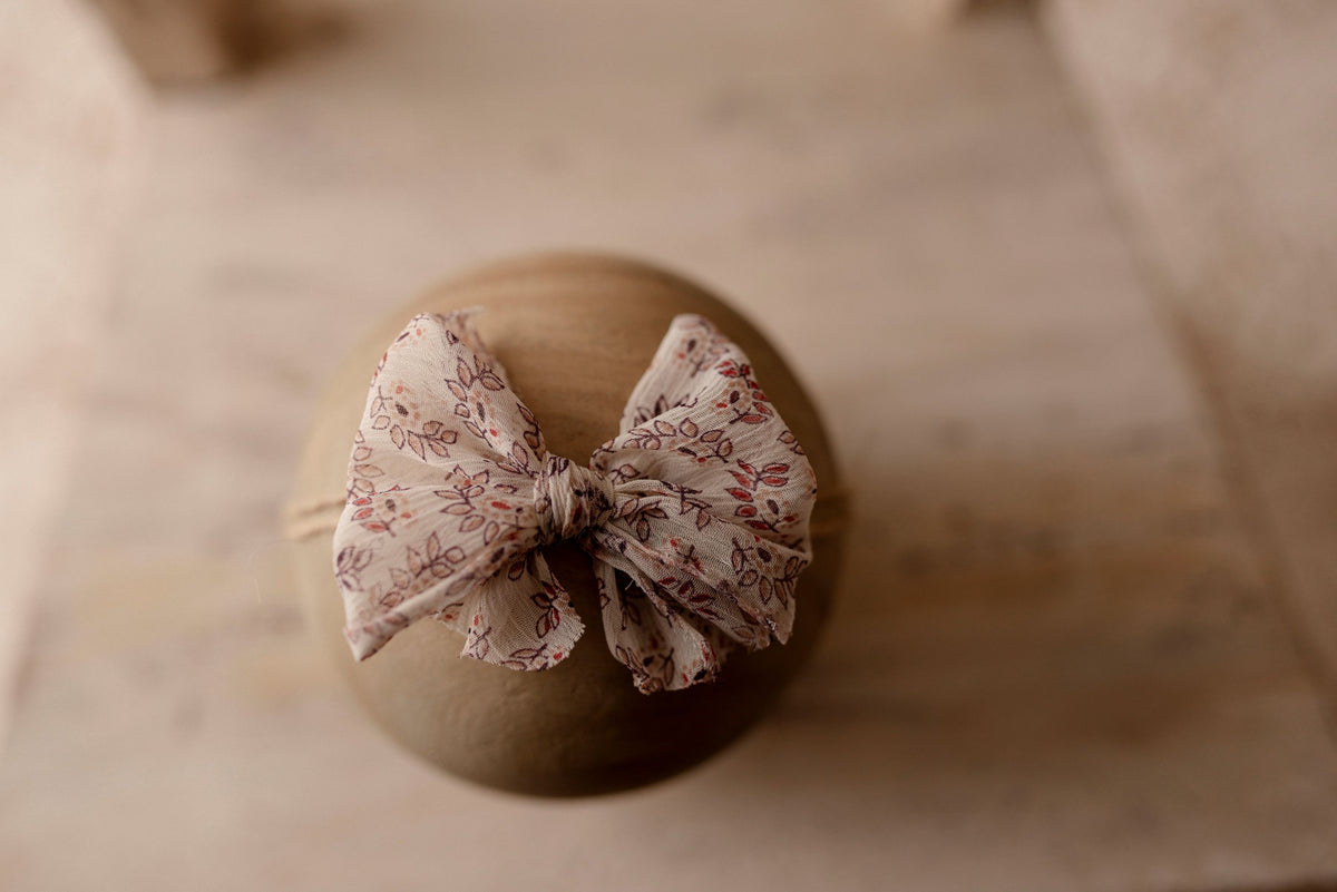 Sweet Pea bow sitter tieback by Olive & Lace