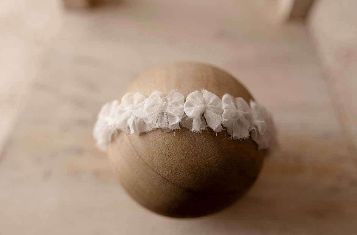White micro bow sitter halo by Olive & Lace